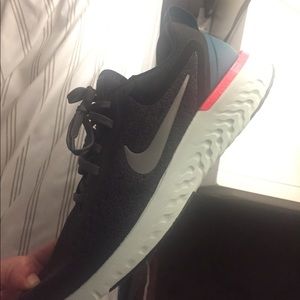 Nike odyssey running shoes- new in box. Never worn